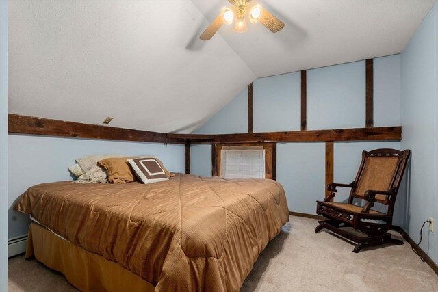 carpeted bedroom with a baseboard heating unit, ceiling fan, and vaulted ceiling