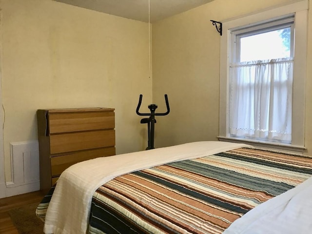 bedroom featuring dark hardwood / wood-style floors