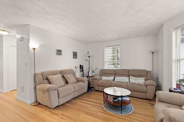 15 N St Unit 2, Haverhill, MA 01830 - living room featuring light wood-style flooring and baseboards