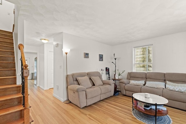 15 N St Unit 2, Haverhill, MA 01830 - living room with light wood-type flooring and stairway
