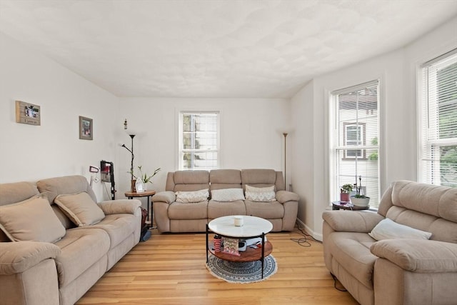 15 N St Unit 2, Haverhill, MA 01830 - living room with healthy amount of natural light and light wood-type flooring
