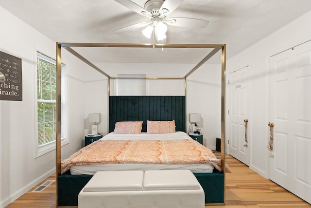 15 N St Unit 2, Haverhill, MA 01830 - bedroom with light wood-type flooring and a ceiling fan