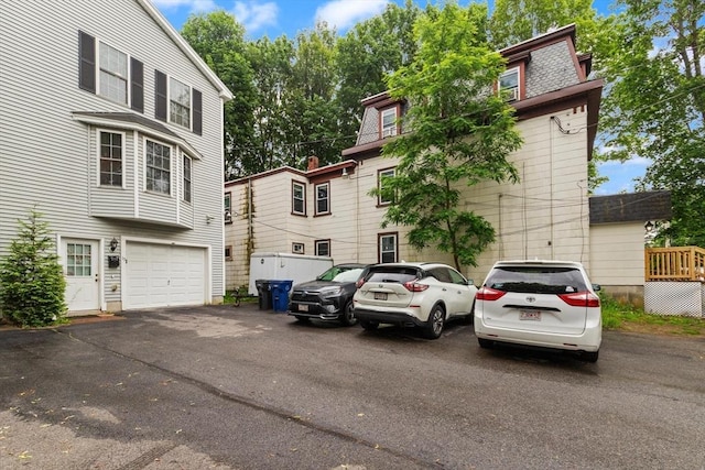 15 N St Unit 2, Haverhill, MA 01830 - view of front of home featuring mansard roof and a garage