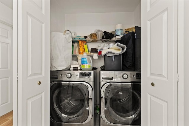 15 N St Unit 2, Haverhill, MA 01830 - laundry room featuring washing machine and clothes dryer and wood finished floors