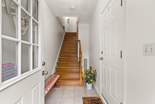15 N St Unit 2, Haverhill, MA 01830 - stairway with tile patterned floors and baseboards
