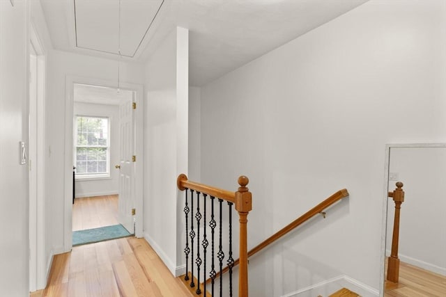15 N St Unit 2, Haverhill, MA 01830 - hallway featuring attic access, an upstairs landing, and wood finished floors