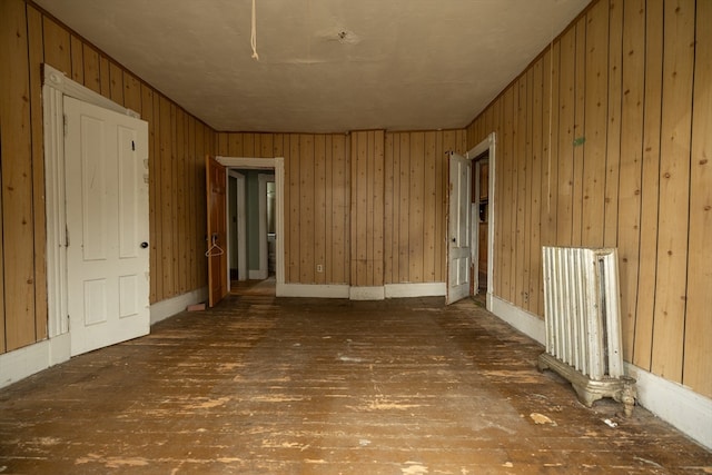 empty room with wooden walls