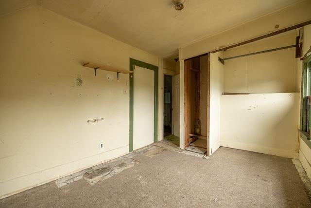 unfurnished bedroom featuring a closet