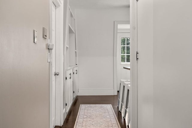 15 Beale St Unit 6, Boston, MA 02124 - hallway featuring dark wood finished floors and baseboards