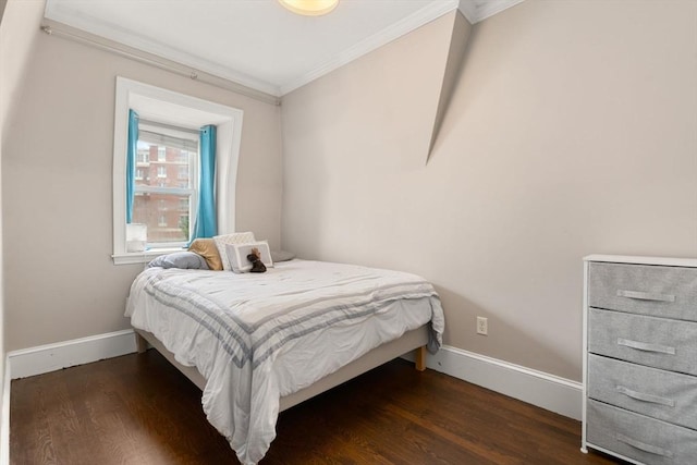 15 Beale St Unit 6, Boston, MA 02124 - bedroom with ornamental molding, wood finished floors, and baseboards