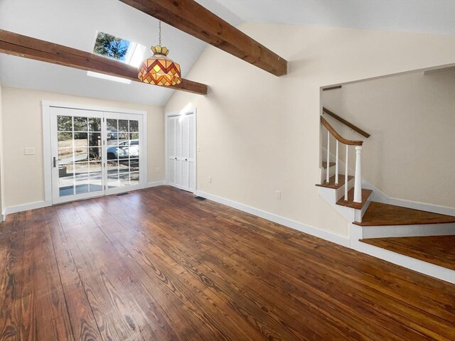 unfurnished living room featuring stairs, beamed ceiling, baseboards, and dark wood-style flooring