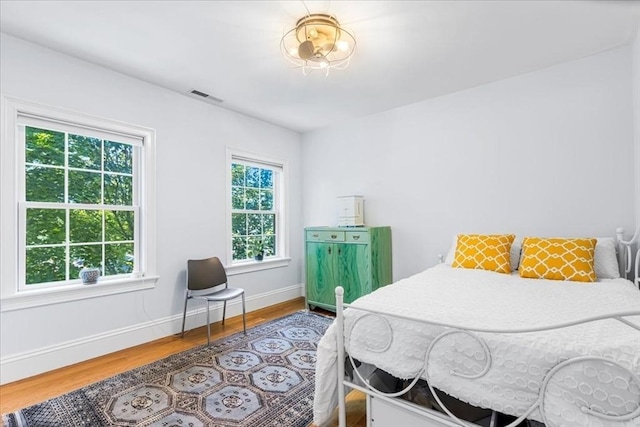 21 Hale St Unit 21, Newton, MA 02464 - bedroom featuring wood finished floors and baseboards