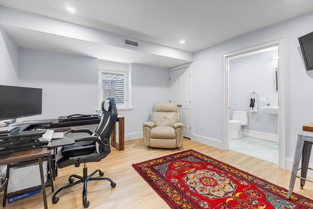 21 Hale St Unit 21, Newton, MA 02464 - home office featuring wood finished floors and recessed lighting