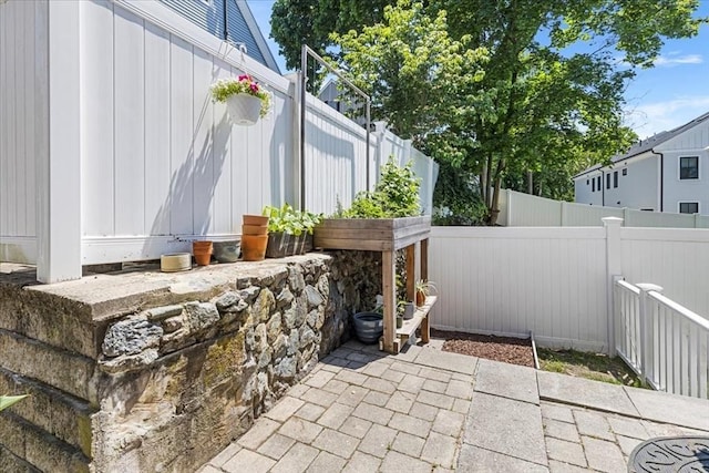 21 Hale St Unit 21, Newton, MA 02464 - fenced backyard featuring a patio