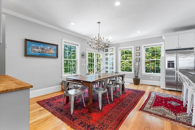 21 Hale St Unit 21, Newton, MA 02464 - dining area featuring a chandelier, crown molding, light wood-type flooring, and recessed lighting
