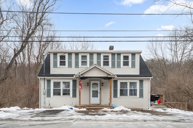 view of front of house featuring a shingled roof