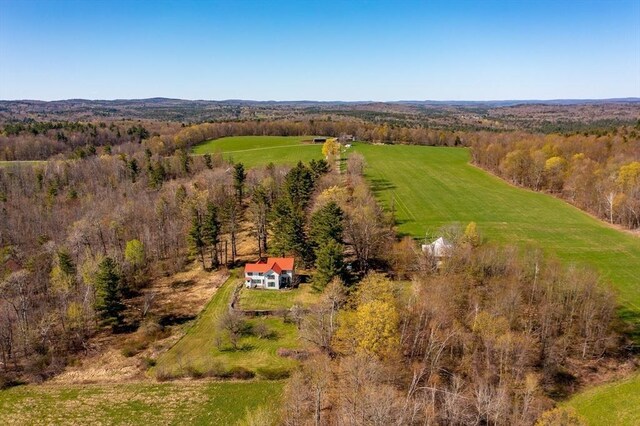 birds eye view of property with a rural view and a forest view