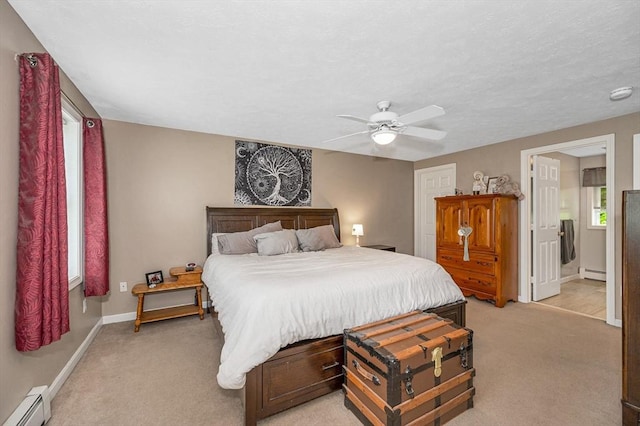 37 Sylvan Rd, Gardner, MA 01440 - bedroom featuring baseboard heating, light carpet, and baseboards