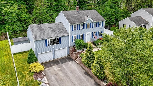37 Sylvan Rd, Gardner, MA 01440 - colonial home with asphalt driveway, a chimney, and a shingled roof