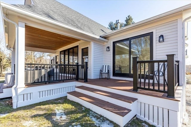 wooden terrace featuring a porch