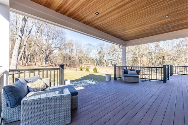 wooden deck with outdoor lounge area