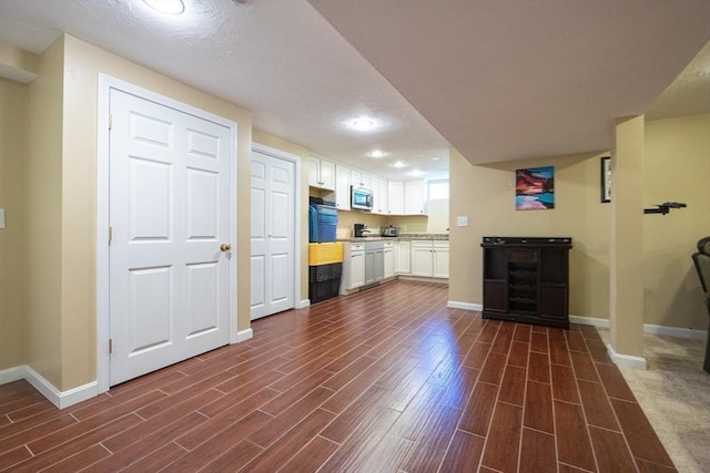 22 Hartley Ave, Brockton, MA 02302 - unfurnished living room featuring dark wood-type flooring and recessed lighting