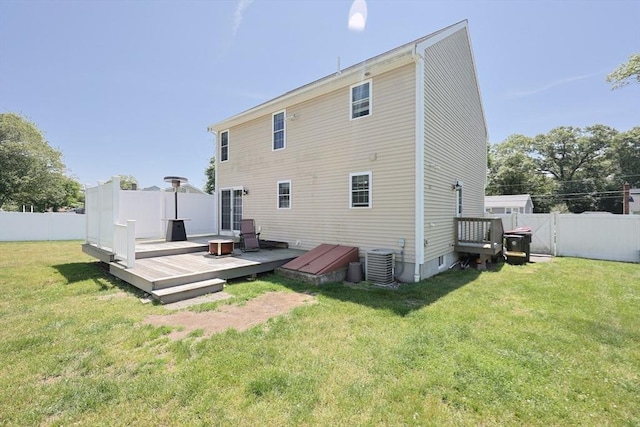 22 Hartley Ave, Brockton, MA 02302 - rear view of house featuring a fenced backyard and a wooden deck