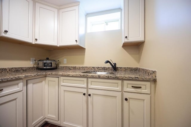 22 Hartley Ave, Brockton, MA 02302 - kitchen with white cabinets and light stone counters