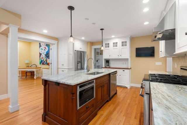 21 Autumn Ln, Marion, MA 02738 - kitchen featuring stainless steel appliances, a sink, baseboards, under cabinet range hood, and tasteful backsplash
