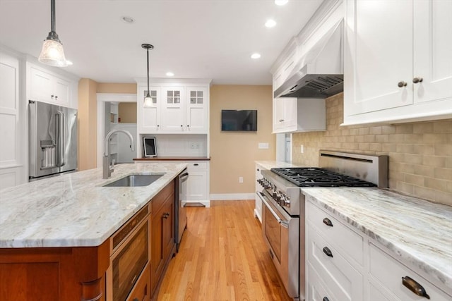 21 Autumn Ln, Marion, MA 02738 - kitchen featuring stainless steel appliances, a sink, ventilation hood, recessed lighting, and light wood finished floors