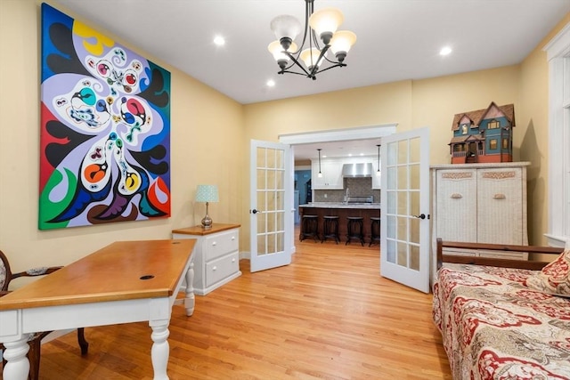 21 Autumn Ln, Marion, MA 02738 - office area with french doors, light wood-style floors, a chandelier, and recessed lighting
