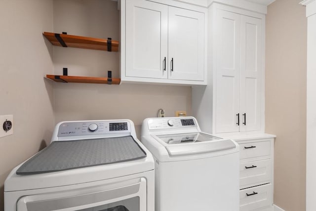 21 Autumn Ln, Marion, MA 02738 - laundry room featuring independent washer and dryer and cabinet space