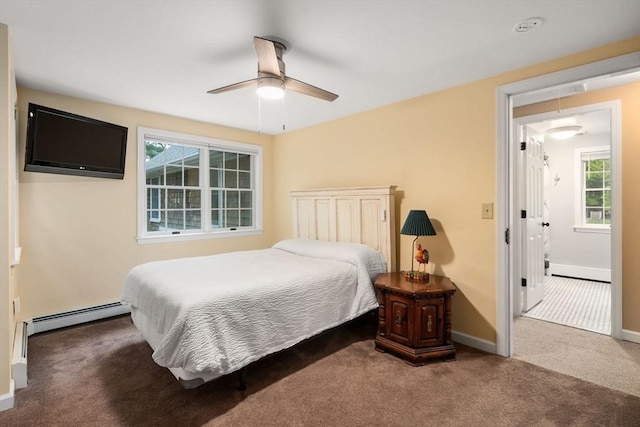 21 Autumn Ln, Marion, MA 02738 - carpeted bedroom with a baseboard radiator, multiple windows, baseboards, and ceiling fan