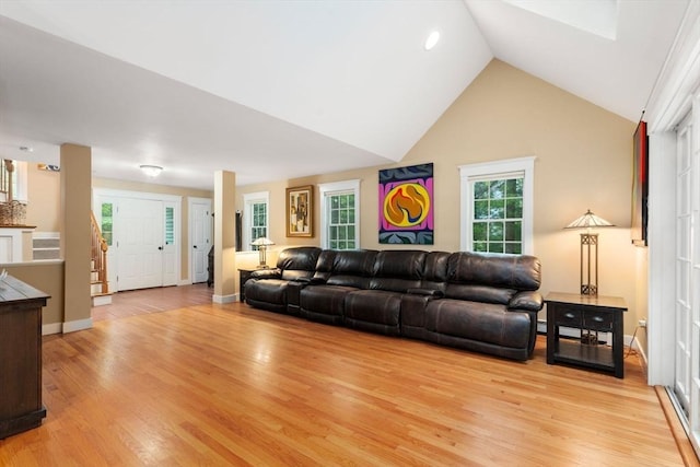 21 Autumn Ln, Marion, MA 02738 - living room with light wood finished floors, high vaulted ceiling, and baseboards