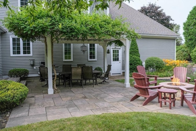 view of patio / terrace featuring a fire pit