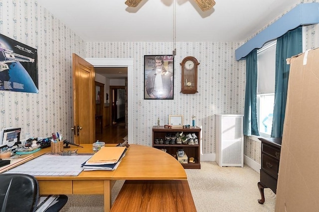 office area with light colored carpet and ceiling fan