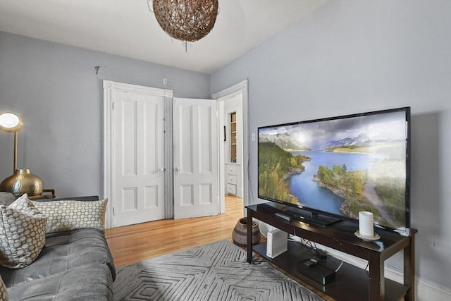 living area with wood finished floors