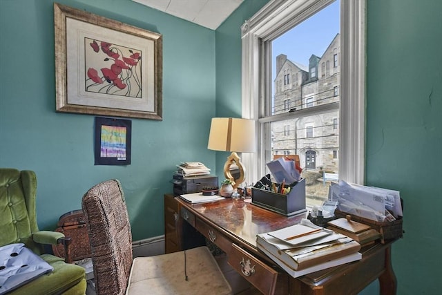 office area featuring baseboards and a wealth of natural light