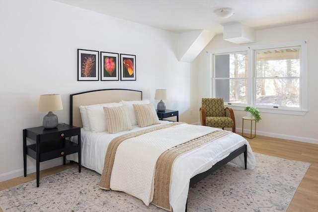 bedroom with light wood-type flooring