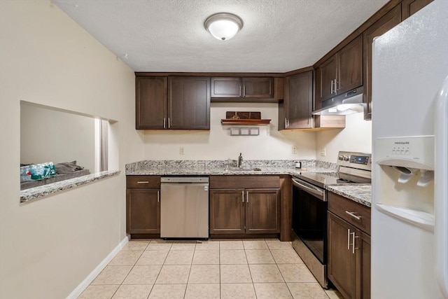 120 Eldridge St Unit 5, Taunton, MA 02780 - kitchen featuring appliances with stainless steel finishes, under cabinet range hood, a sink, dark brown cabinets, and a textured ceiling