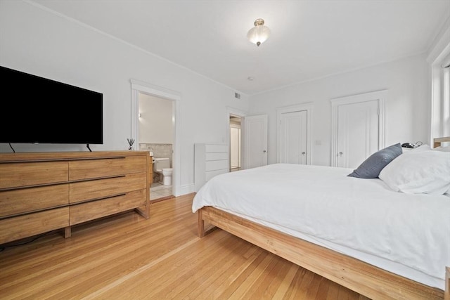 4 Fairbanks Unit 2, Brookline, MA 02446 - bedroom featuring light wood-type flooring and connected bathroom