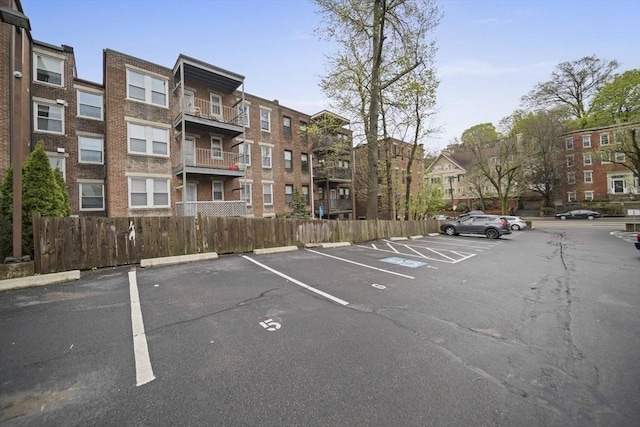 4 Fairbanks Unit 2, Brookline, MA 02446 - uncovered parking lot with fence