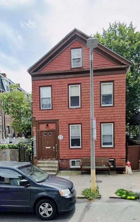 view of front of house with fence