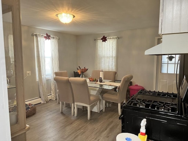 dining room featuring light wood-style flooring