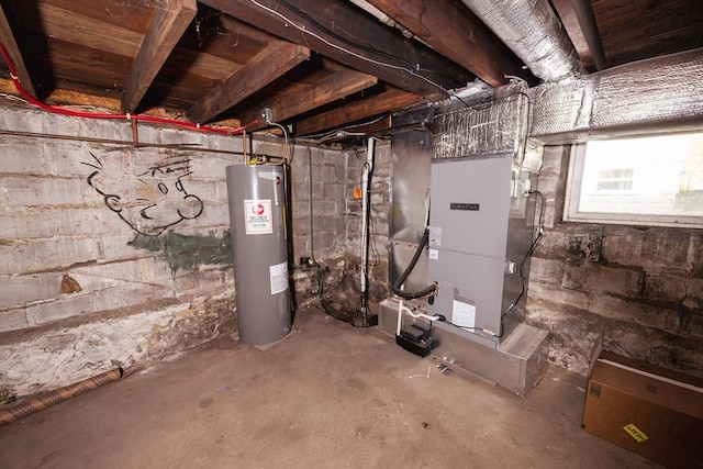 utility room with electric water heater and heating unit