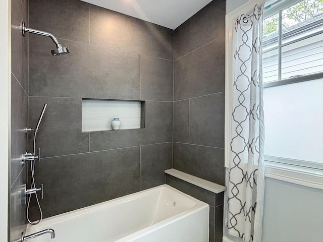 bathroom featuring shower / bath combination with curtain