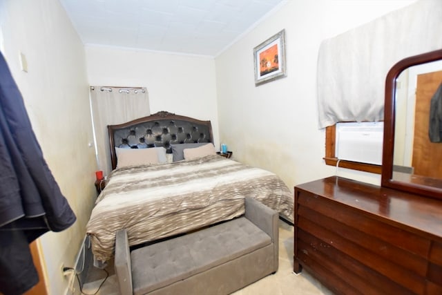 bedroom featuring ornamental molding