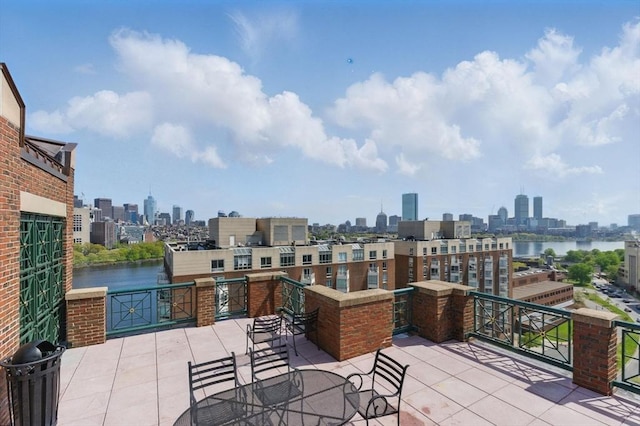 10 Rogers St Unit Ph19, Cambridge, MA 02142 - view of patio / terrace featuring a water view and a view of city