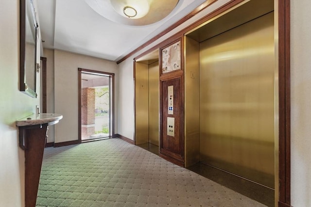 10 Rogers St Unit Ph19, Cambridge, MA 02142 - entryway featuring baseboards, elevator, and carpet flooring