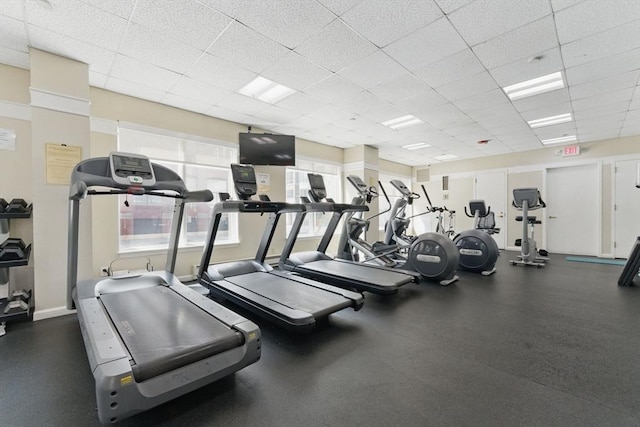 10 Rogers St Unit Ph19, Cambridge, MA 02142 - workout area with a paneled ceiling and baseboards